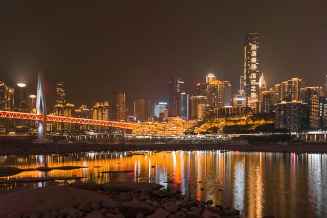 Chongqing: Vertical Streets, Hotpot That Numbs, and a Train Through a Building